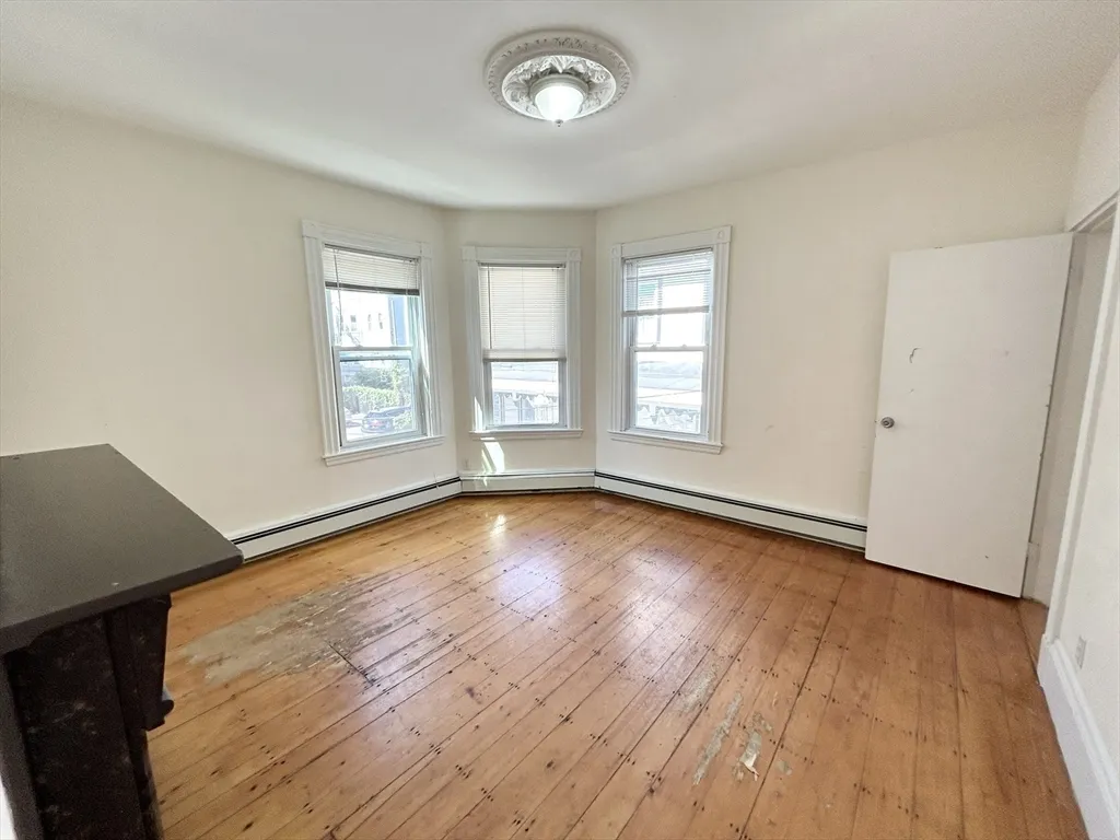 4 bed, 1 bath apartment for rent at 1 Folsom Ave Unit 2, Mission Hill — photo 4 of 9