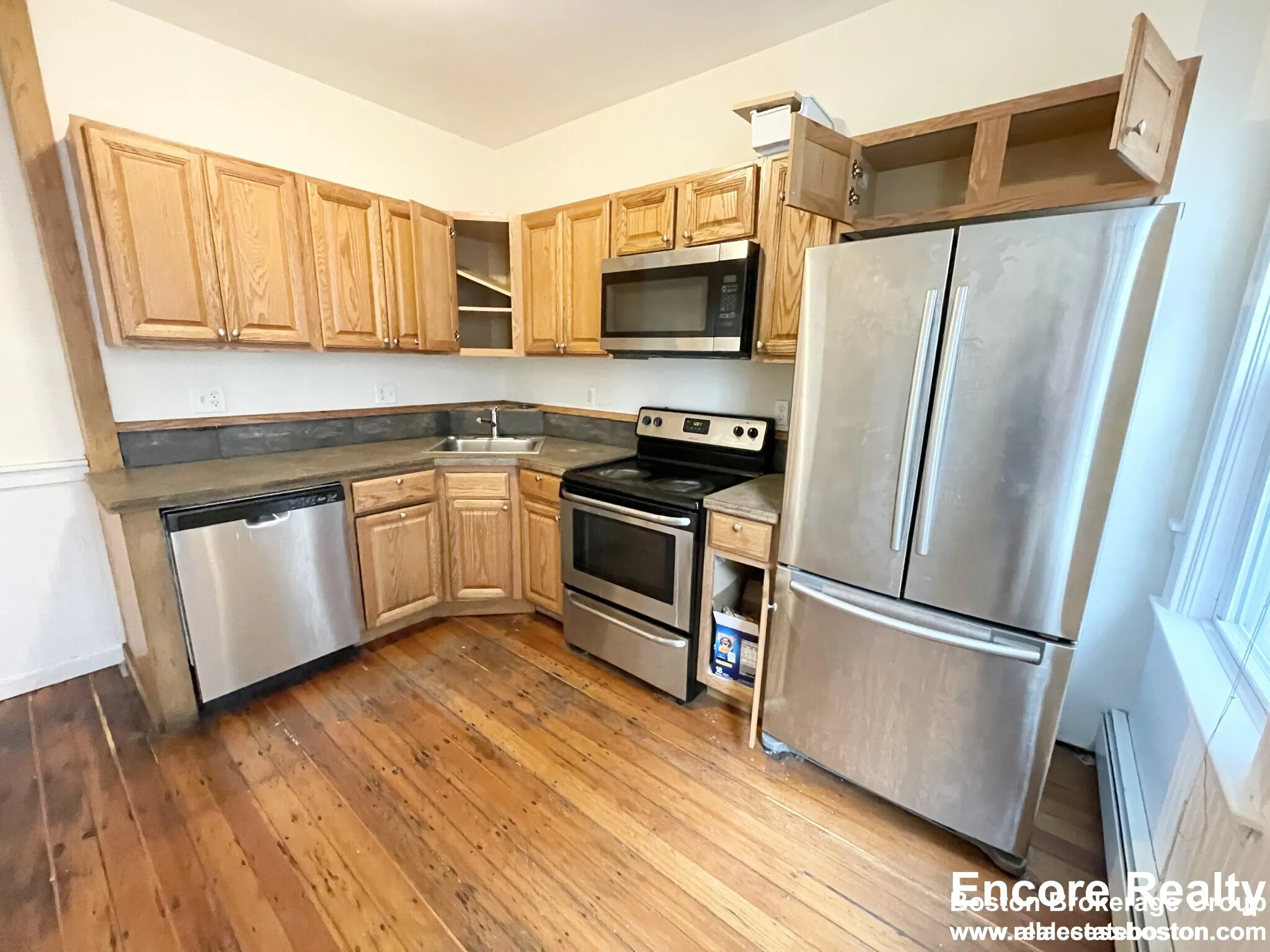 4 bed, 1.5 bath apartment for rent at 1 Folsom Ave Unit MM, Mission Hill — photo 1 of 16