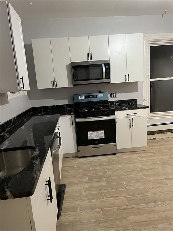 4 bed, 1 bath apartment for rent at 1 Gannett St Unit 2, Dorchester — photo 2 of 4