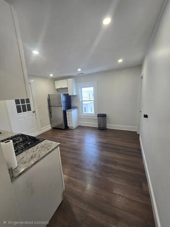 3 bed, 1 bath apartment for rent at 1 Rockdale Ave Unit 2, Lowell — photo 2 of 9