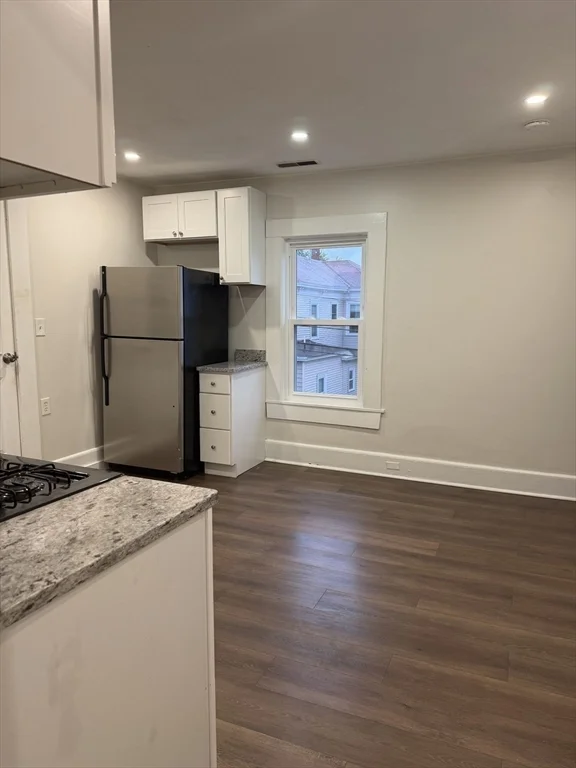 3 bed, 1 bath apartment for rent at 1 Rockdale Unit 2, Lowell — photo 4 of 10