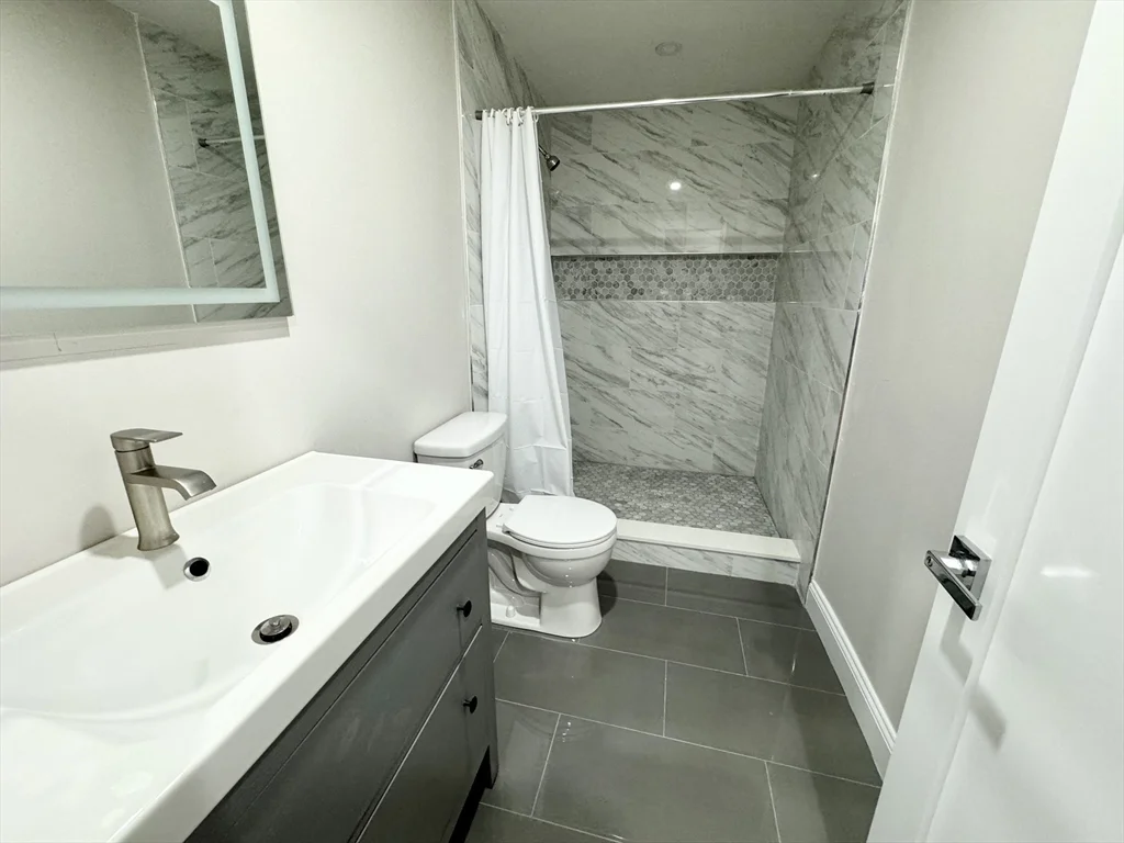 4 bed, 1 bath apartment for rent at 10 Pond Unit 3, Boston — photo 7 of 8