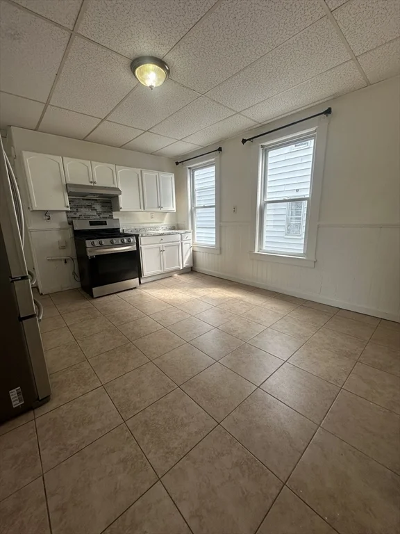3 bed, 1 bath apartment for rent at 100 Aiken Ave Unit 2, Lowell — photo 2 of 13