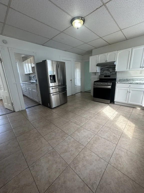 3 bed, 1 bath apartment for rent at 100 Aiken Ave Unit 2, Lowell — photo 1 of 13