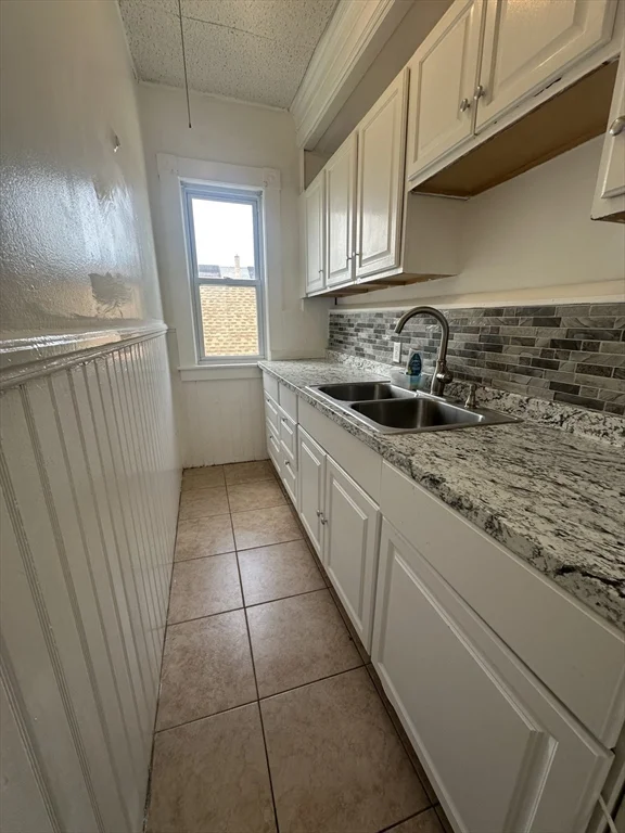 3 bed, 1 bath apartment for rent at 100 Aiken Ave Unit 2, Lowell — photo 4 of 13