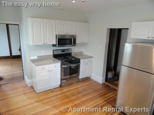 4 bed, 1 bath apartment for rent at 101 Heath St Unit 1, Winter Hill — photo 2 of 10