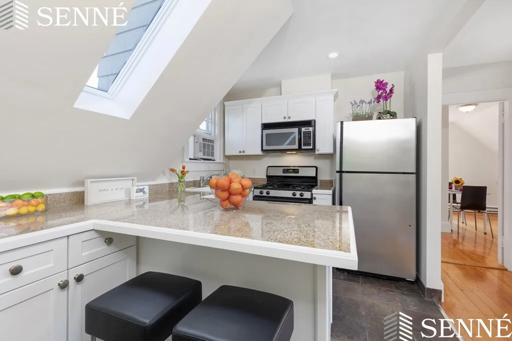 1 bed, 1 bath apartment for rent at 103 Liberty Ave Unit 5, Powder House Square — photo 4 of 19
