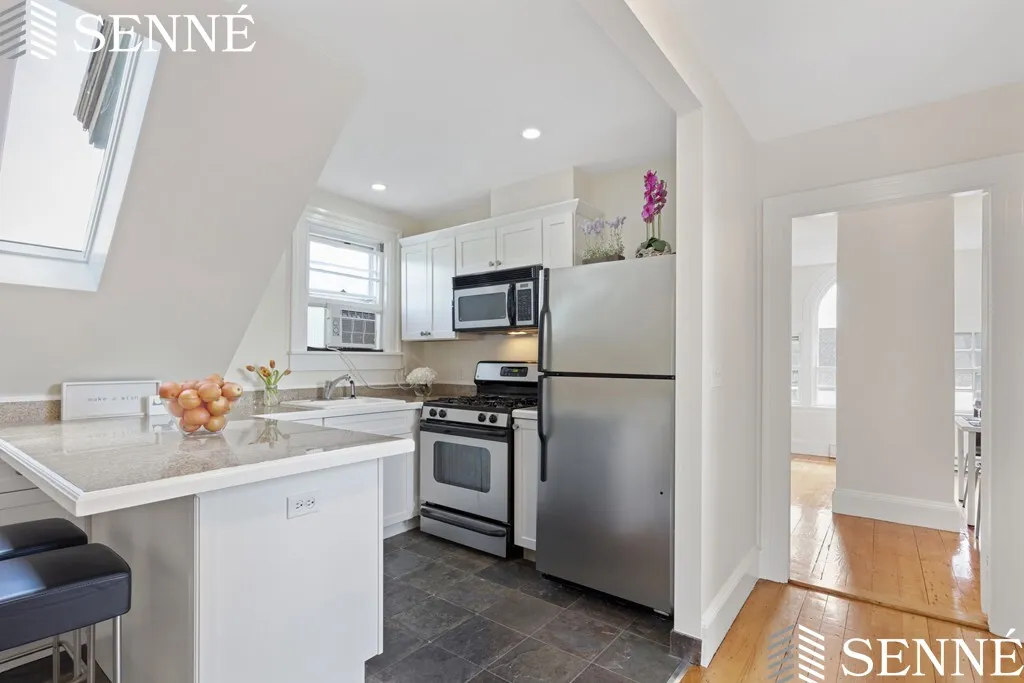 1 bed, 1 bath apartment for rent at 103 Liberty Ave Unit 5, Powder House Square — photo 3 of 19