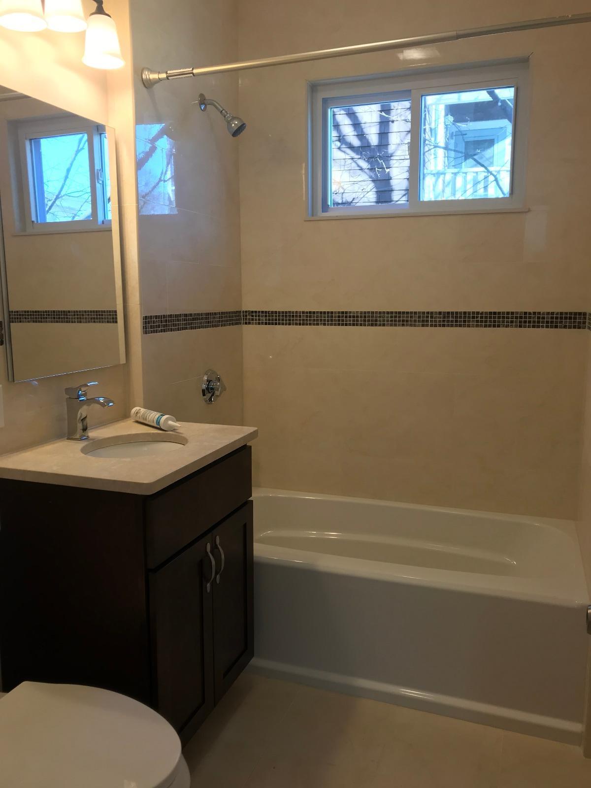 4 bed, 2 bath apartment for rent at 11 Atkins St Unit 2, Oak Square — photo 1 of 4