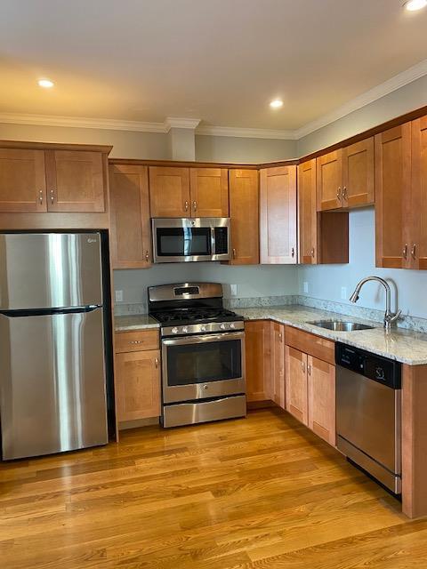 3 bed, 2.5 bath apartment for rent at 11 Marney St Unit 1, Wellington-Harrington — photo 1 of 14