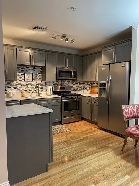 2 bed, 1.5 bath apartment for rent at 1100 Vfw Pkwy Unit 105, West Roxbury — photo 2 of 18