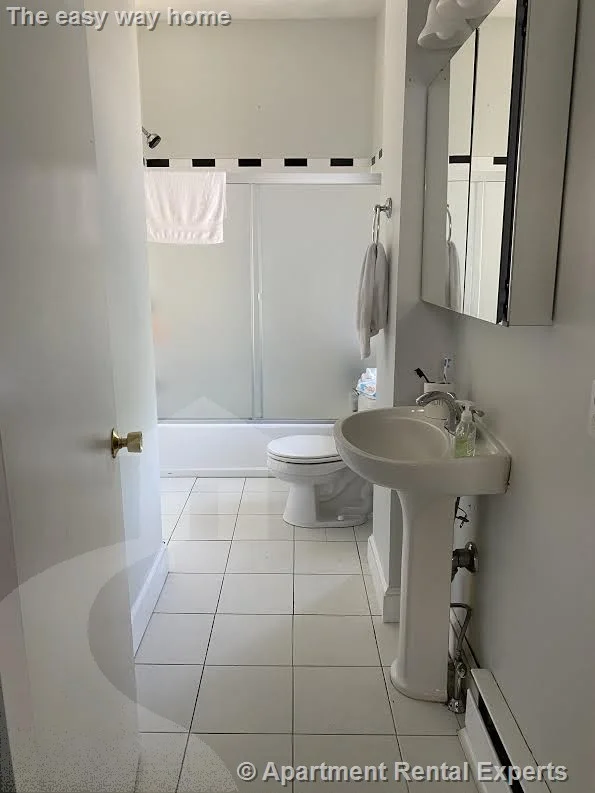 4 bed, 2 bath apartment for rent at 117 Hampshire St Unit 2, Wellington-Harrington — photo 6 of 10