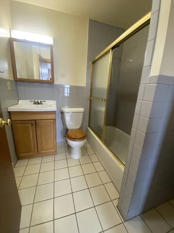 4 bed, 2 bath apartment for rent at 118 Charles St Unit 2, Waltham — photo 4 of 15