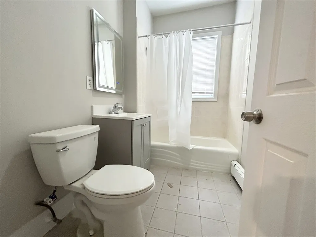 4 bed, 1 bath apartment for rent at 12 Buttonwood Unit 2, Boston — photo 8 of 9