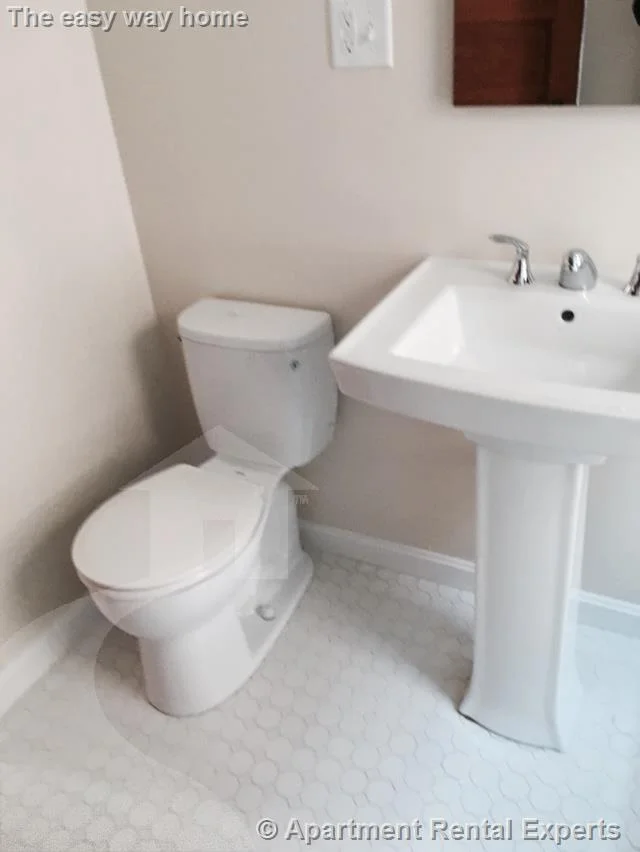 2 bed, 1 bath apartment for rent at 12 Charles E Ryan Rd Unit 1, Magoun Square — photo 8 of 17