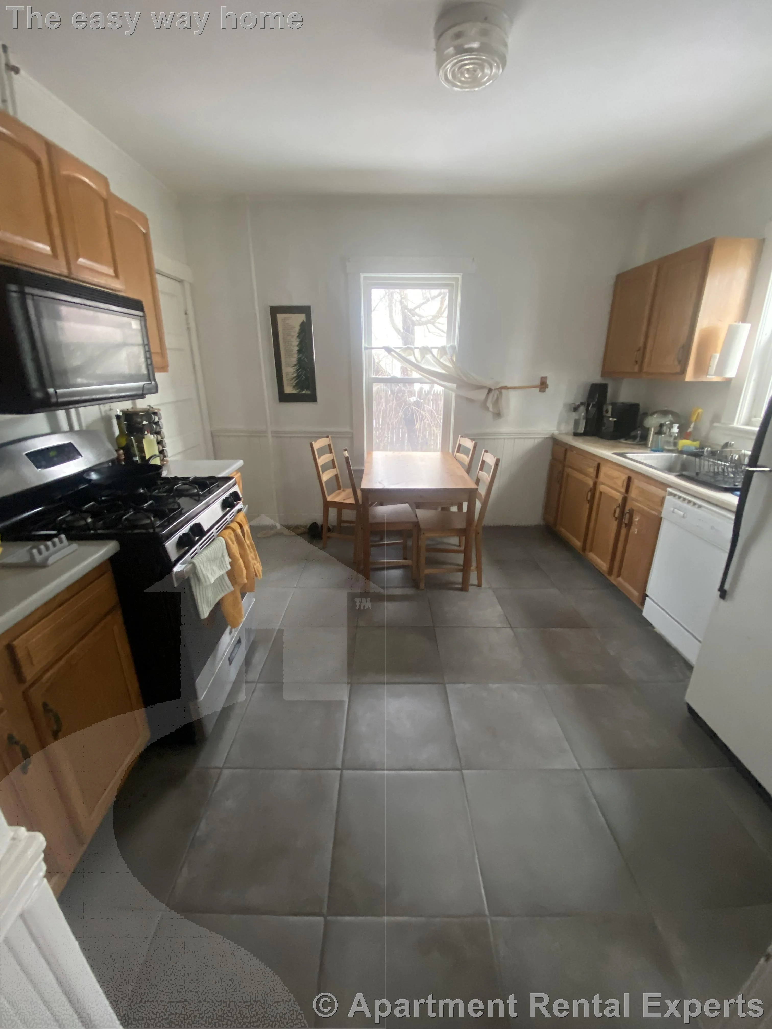 2 bed, 1 bath apartment for rent at 12 Charles E Ryan Rd Unit 1, Magoun Square — photo 16 of 17