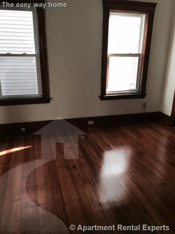 2 bed, 1 bath apartment for rent at 12 Charles E Ryan Rd Unit 1, Magoun Square — photo 5 of 17