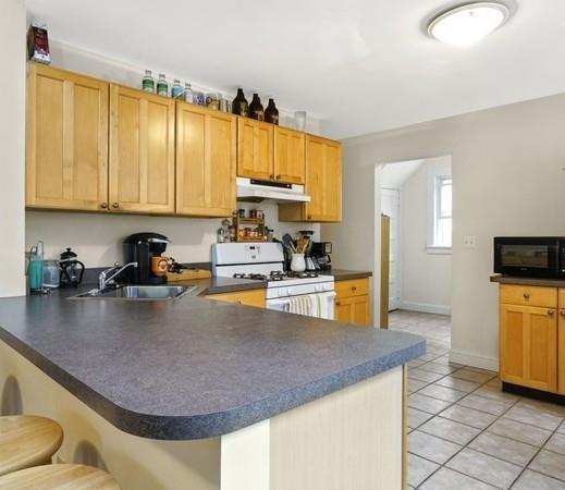 4 bed, 1.5 bath apartment for rent at 12 Cutter Ave Unit 1, Davis Square — photo 1 of 8