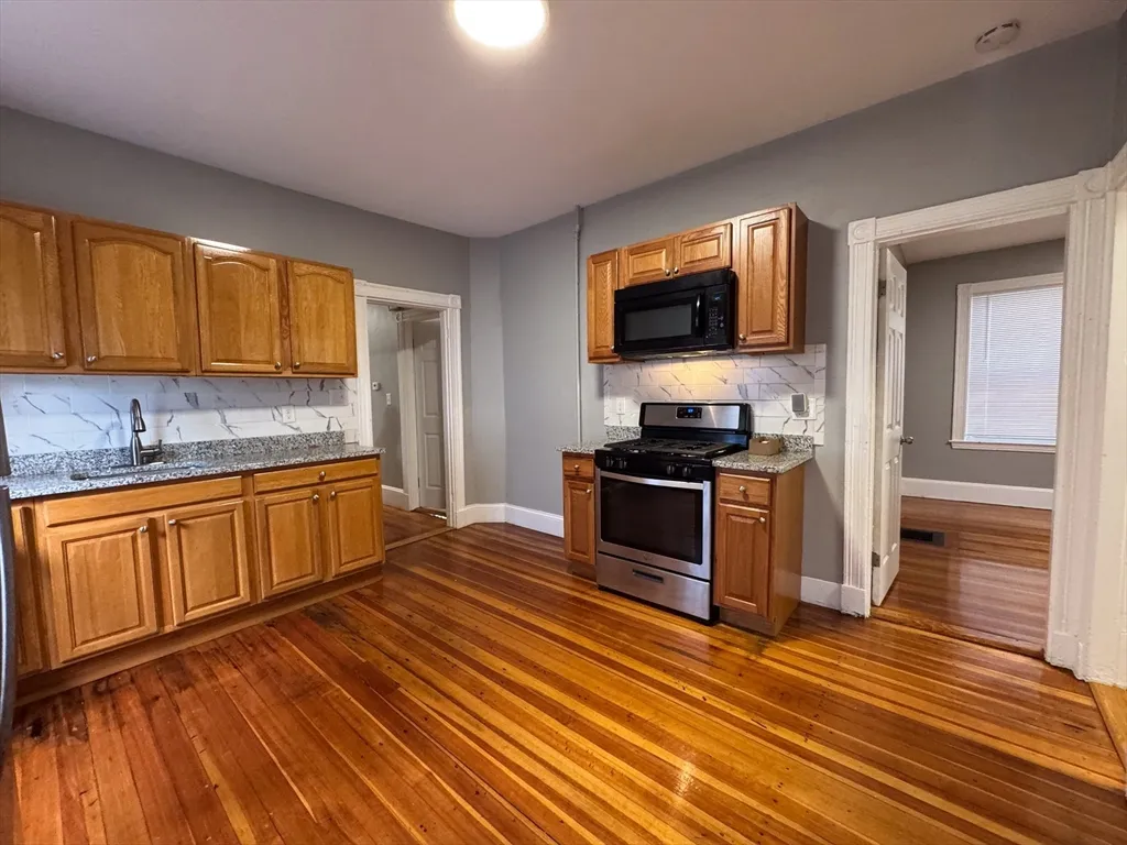 4 bed, 1 bath apartment for rent at 12 Dalrymple St Unit 2, Jamaica Plain — photo 2 of 21
