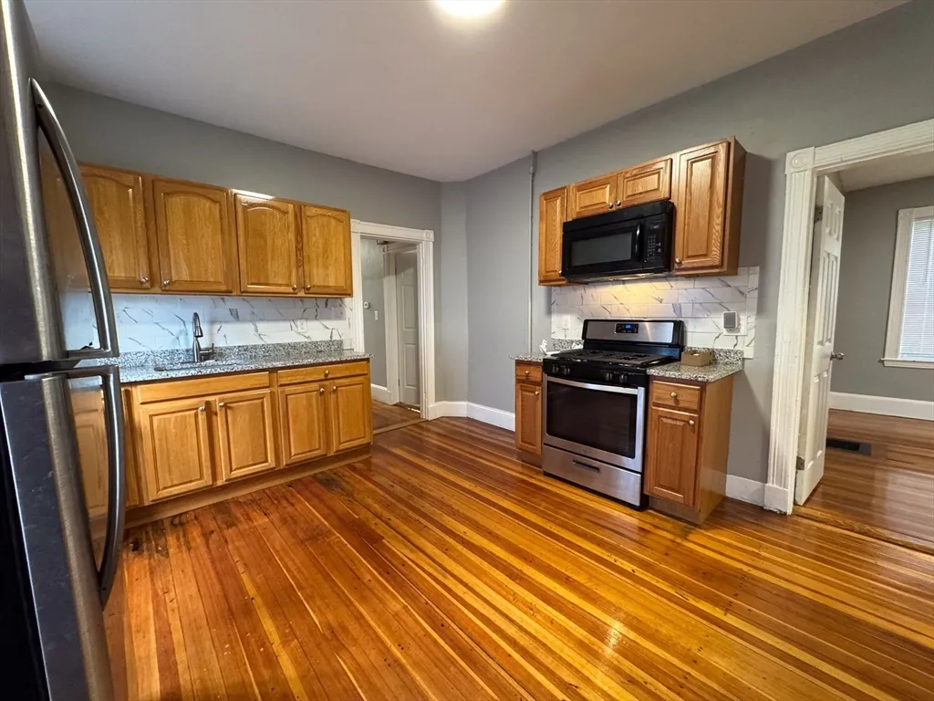 4 bed, 1 bath apartment for rent at 12 Dalrymple St Unit 2, Jamaica Plain — photo 1 of 21