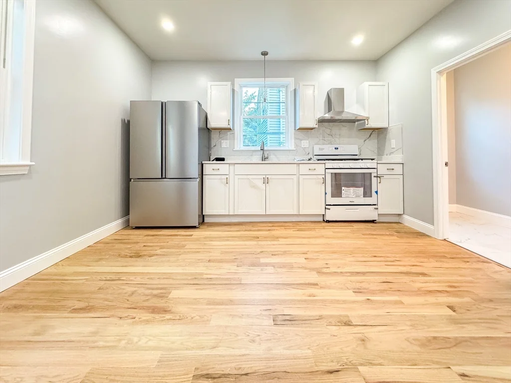 3 bed, 1 bath apartment for rent at 12 Magdala St Unit 1, Boston — photo 5 of 11