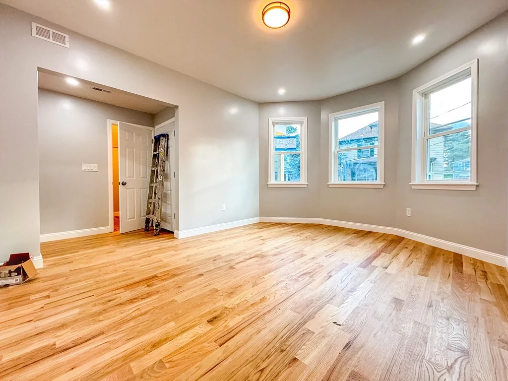 3 bed, 1 bath apartment for rent at 12 Magdala St Unit 1, Boston — photo 2 of 11