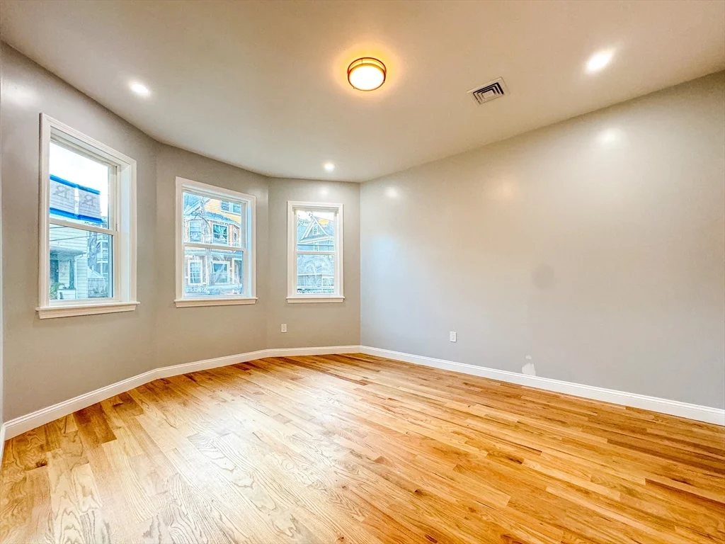 3 bed, 1 bath apartment for rent at 12 Magdala St Unit 1, Boston — photo 1 of 11