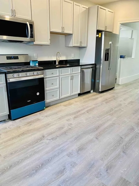 5 bed, 2 bath apartment for rent at 12 O St Unit 1, South Boston — photo 3 of 17