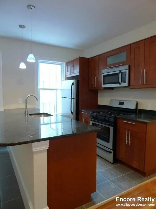 5 bed, 2 bath apartment for rent at 12 Wensley St Unit 1, Mission Hill — photo 3 of 52