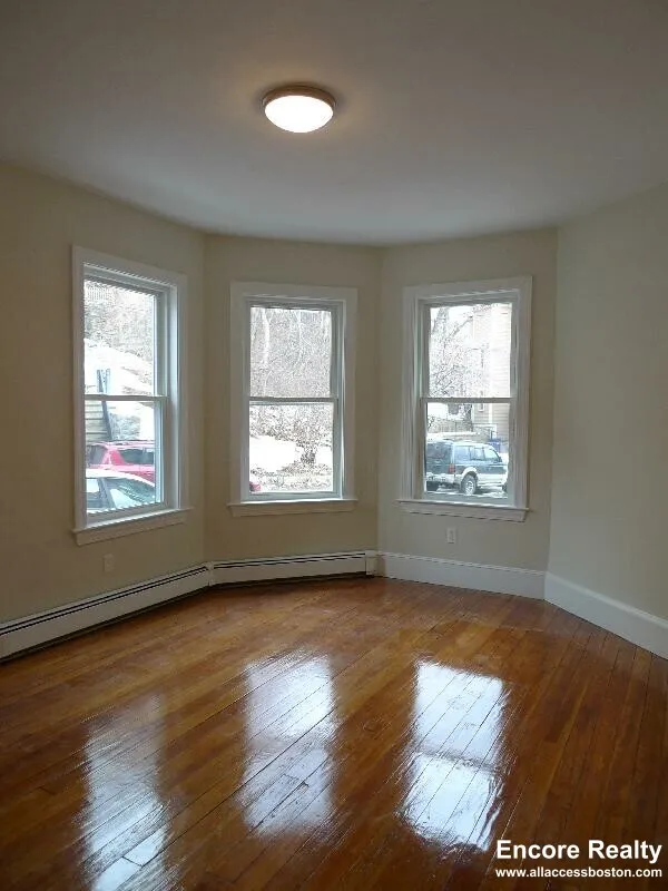5 bed, 2 bath apartment for rent at 12 Wensley St Unit 1, Mission Hill — photo 4 of 52