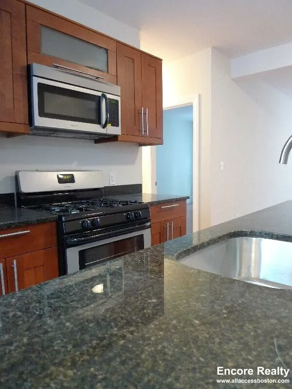 5 bed, 2 bath apartment for rent at 12 Wensley St Unit 1, Mission Hill — photo 2 of 52
