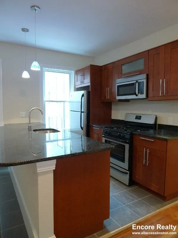 5 bed, 2 bath apartment for rent at 12 Wensley St Unit 1, Mission Hill — photo 1 of 52
