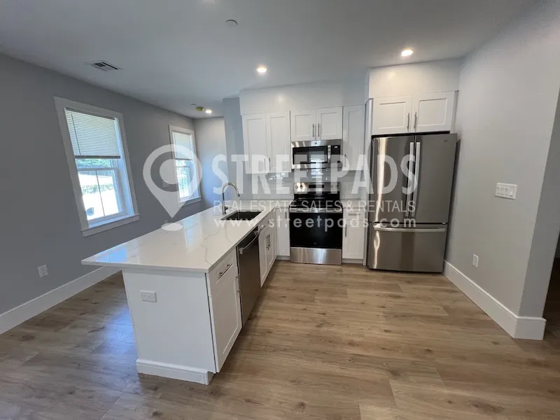 4 bed, 3 bath apartment for rent at 124 Kenrick St Unit 6, Brighton — photo 2 of 23