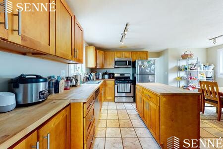 3.5 bed, 1 bath apartment for rent at 124 Walnut St Unit 1, Winter Hill — photo 3 of 11