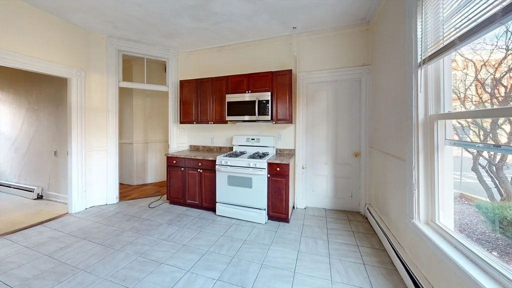 4 bed, 2 bath apartment for rent at 129 Saint Alphonsus Unit 1, Mission Hill — photo 2 of 11