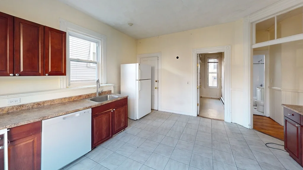 4 bed, 2 bath apartment for rent at 129 Saint Alphonsus Unit 1, Mission Hill — photo 1 of 11