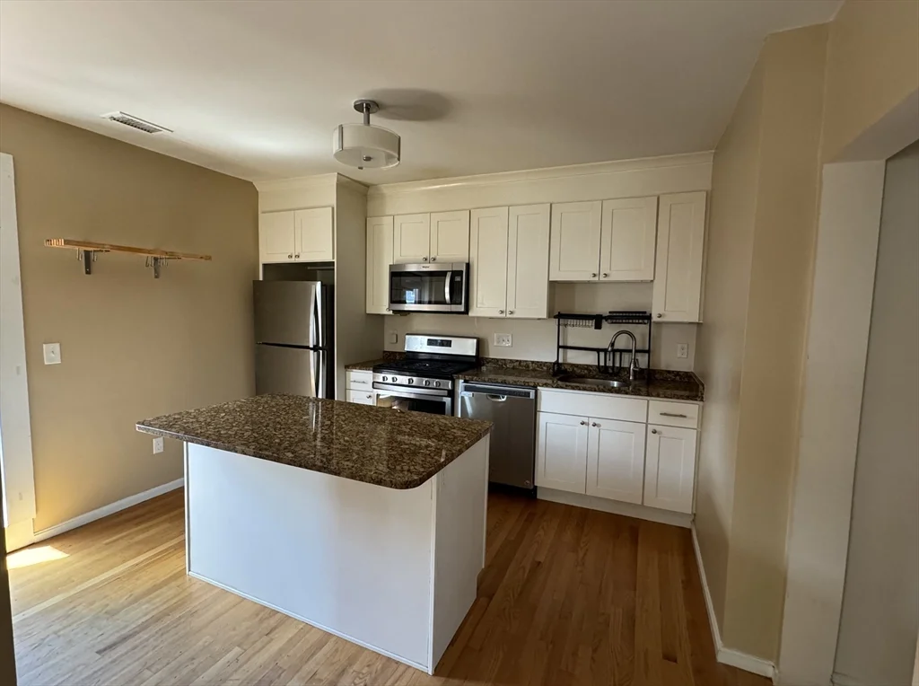 4 bed, 2 bath apartment for rent at 13 Grant St Unit 2, Dorchester — photo 2 of 21