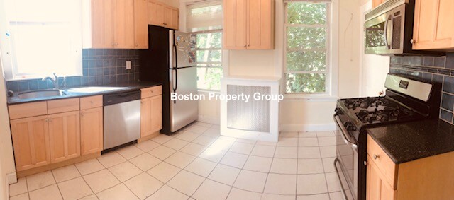 4 bed, 1.5 bath apartment for rent at 13 Sparhawk St Unit 2, Brighton — photo 1 of 18