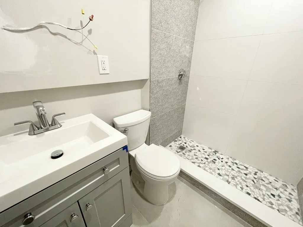 5 bed, 2 bath apartment for rent at 130 P Unit 2, Boston — photo 19 of 23