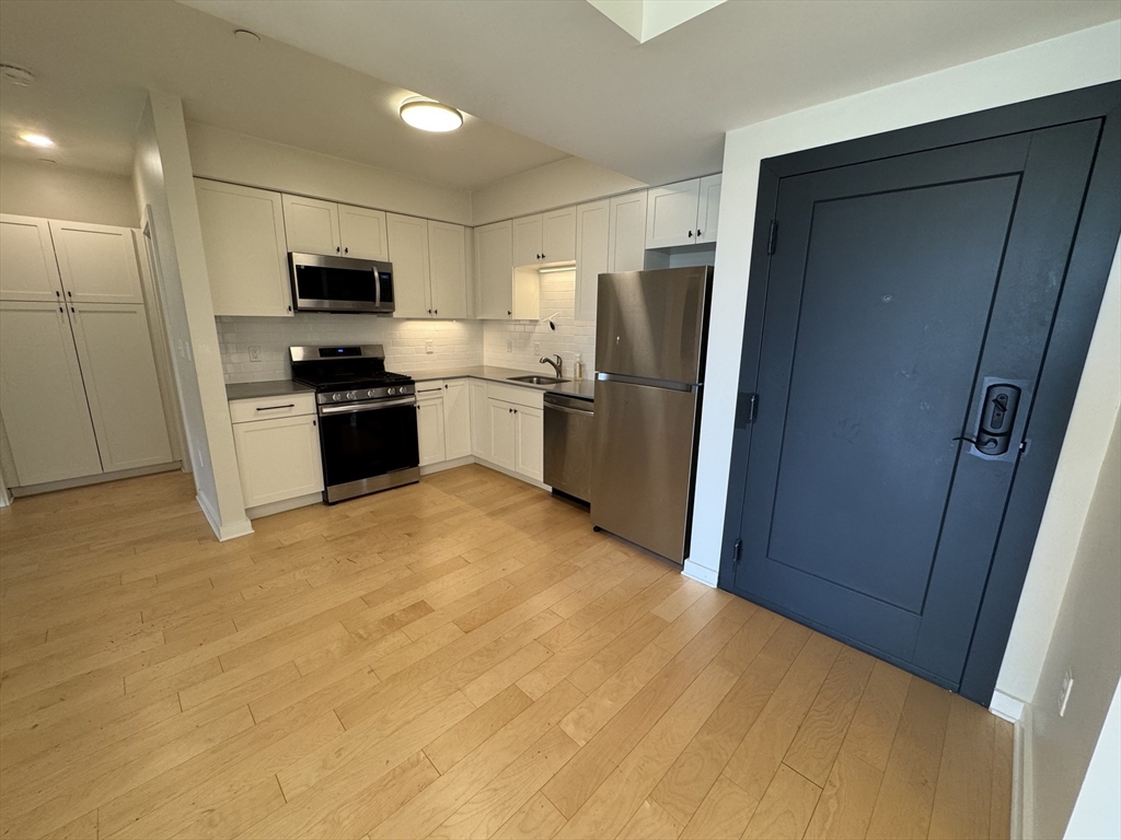 2 bed, 1 bath apartment for rent at 1301 Blue Hill Ave Unit 401, Mattapan — photo 2 of 16
