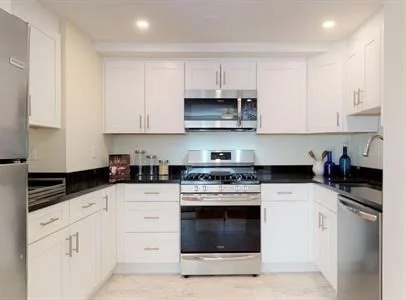 5 bed, 2 bath apartment for rent at 137 Glenville Ave Unit 2, Allston — photo 4 of 18