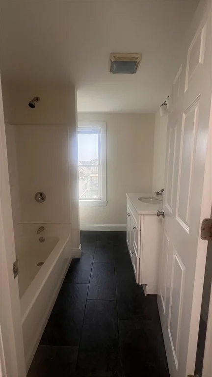 4 bed, 3 bath apartment for rent at 14 Humboldt Pl Unit 1, South Boston — photo 13 of 27