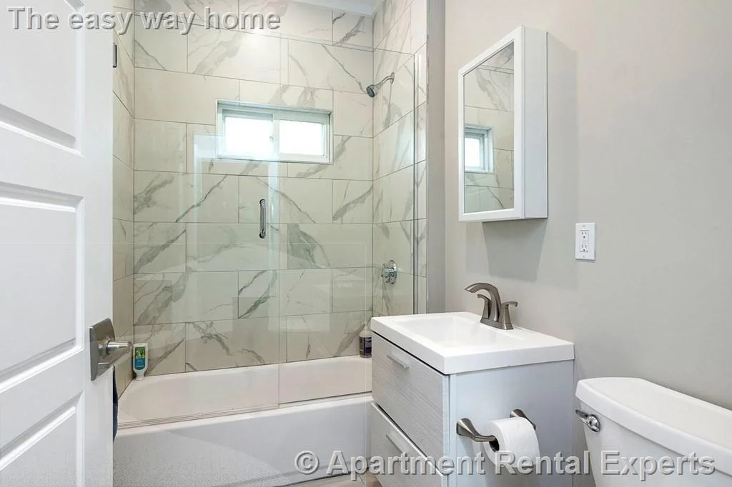 4 bed, 2 bath apartment for rent at 14 Stickney Ave Unit 1, Winter Hill — photo 3 of 10
