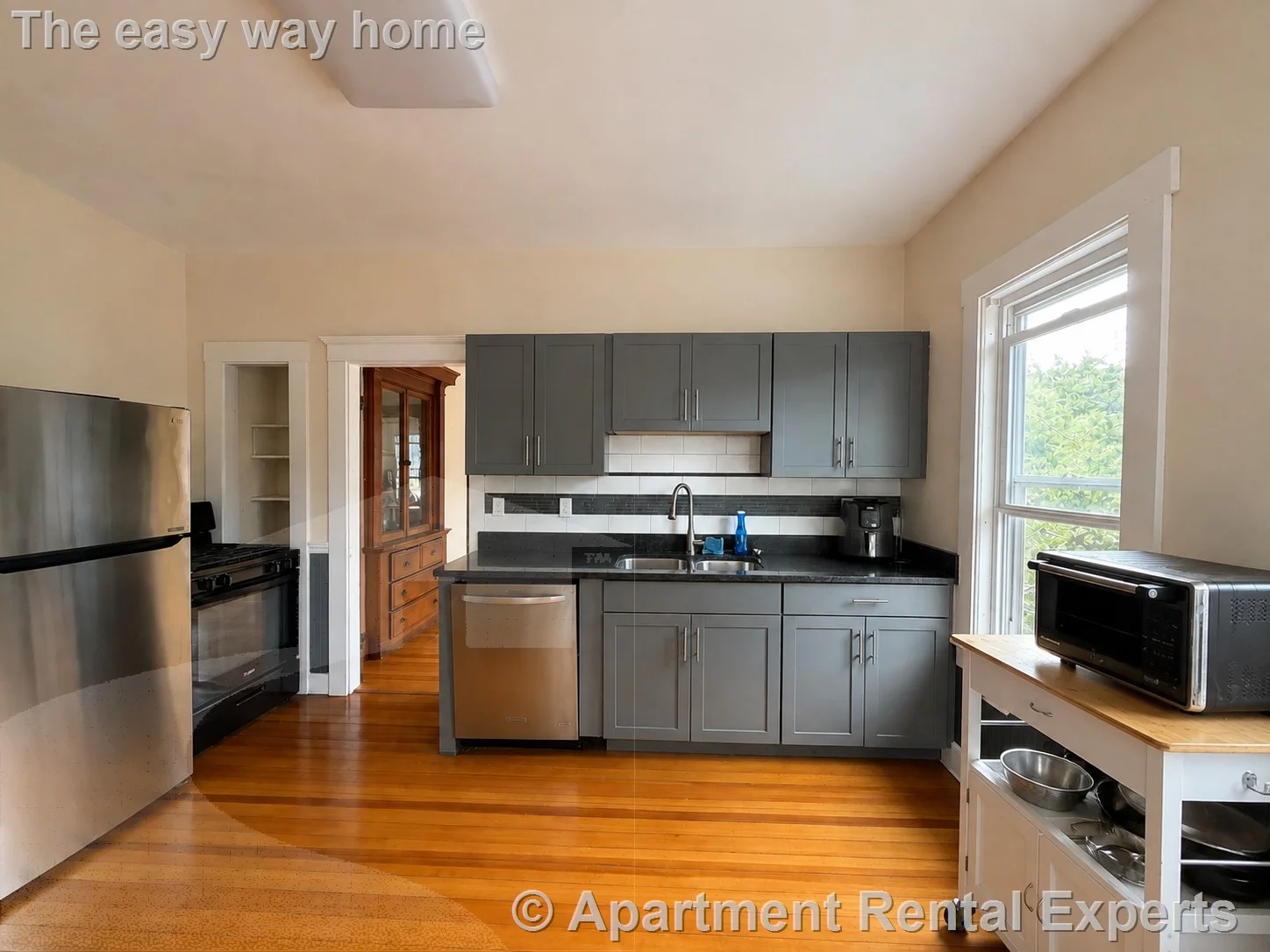 4 bed, 1 bath apartment for rent at 14 Warner St Unit 2, Powder House Square — photo 1 of 16