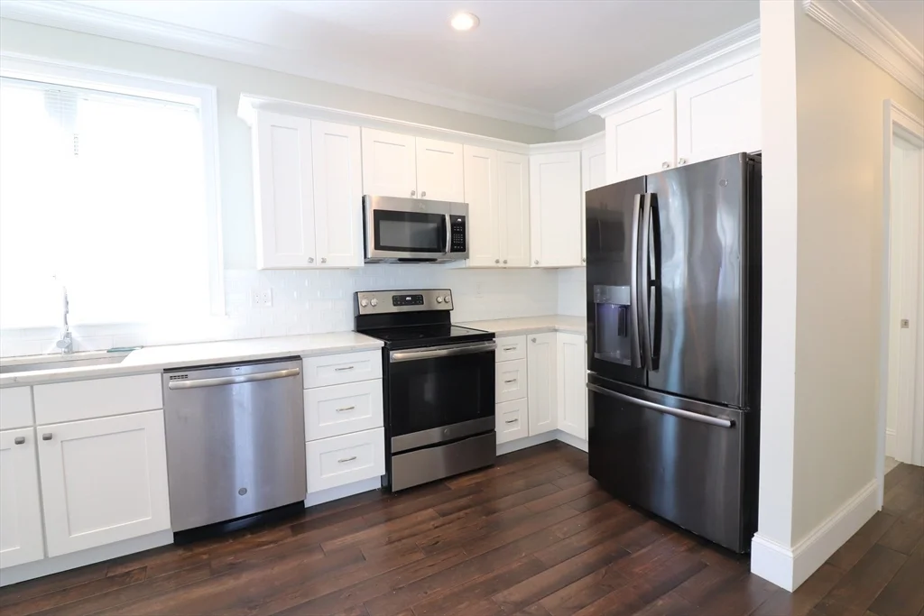 4 bed, 2 bath apartment for rent at 140 Minden St Unit 2, Jamaica Plain — photo 1 of 14