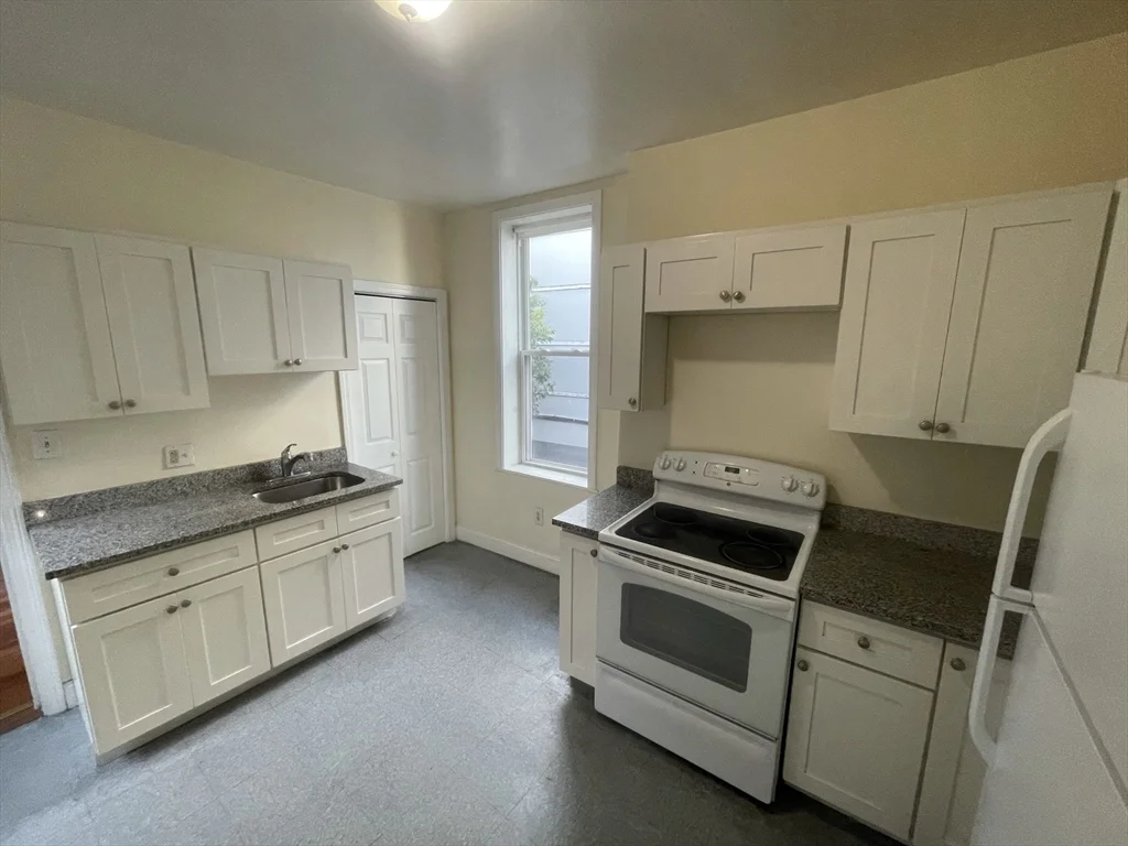 2 bed, 1 bath apartment for rent at 1441 Tremont St Unit 2, Mission Hill — photo 2 of 14