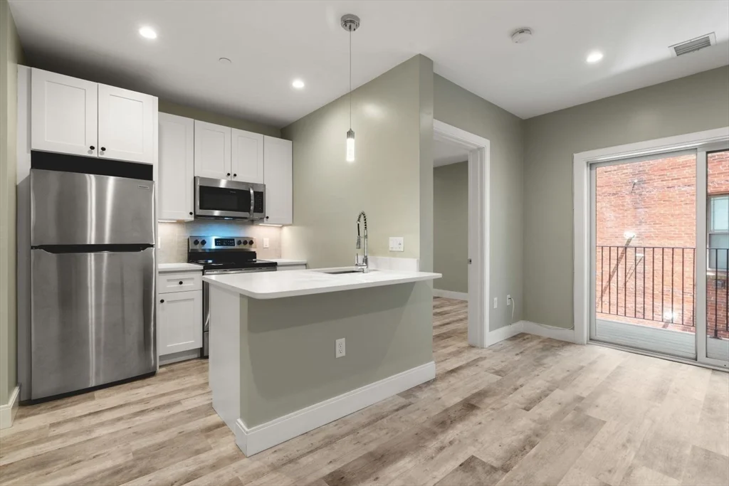 1 bed, 1 bath apartment for rent at 1457 Tremont St Unit 210, Mission Hill — photo 1 of 23