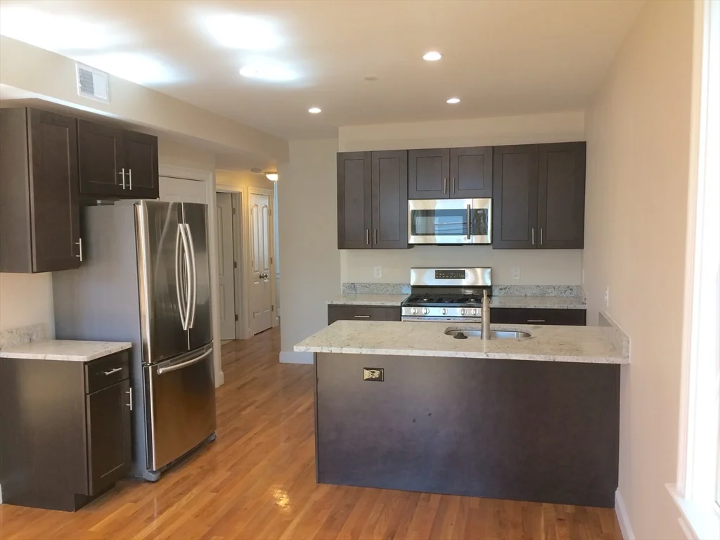 2 bed, 1 bath apartment for rent at 15 Plymouth St Unit 2, Wellington-Harrington — photo 4 of 7