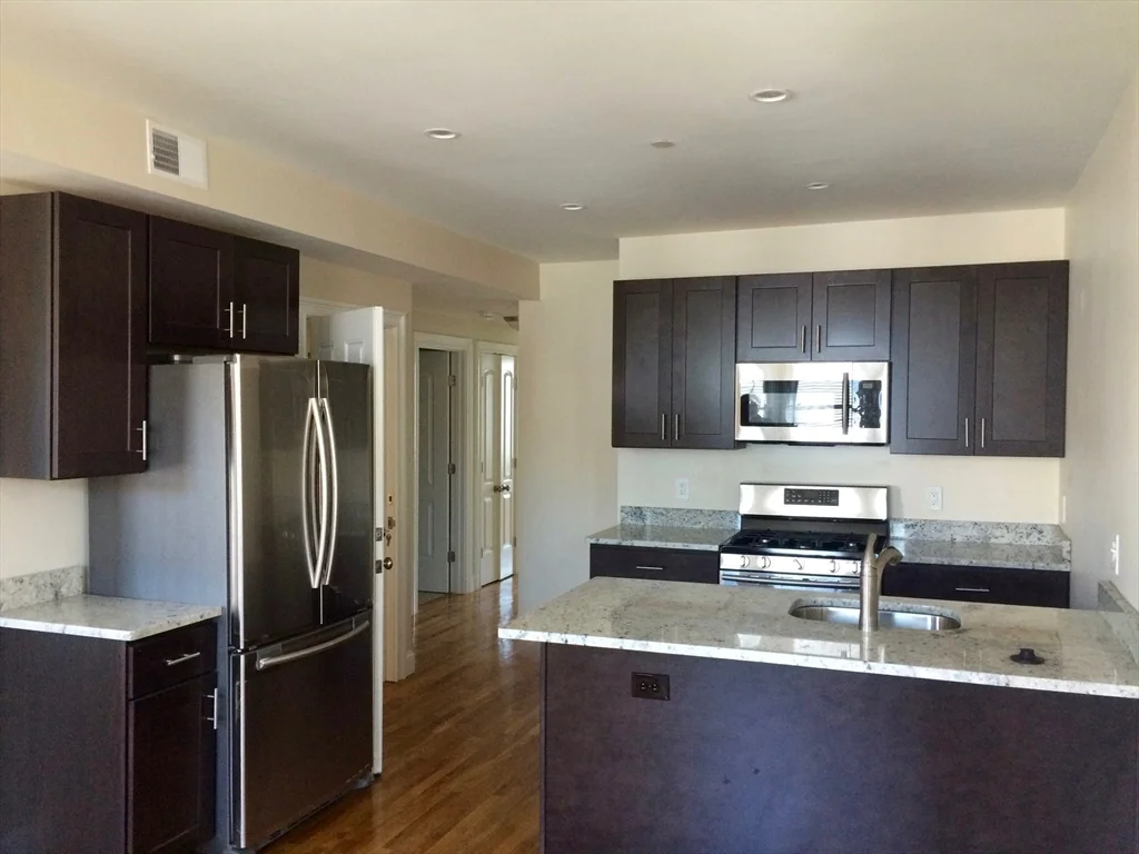 2 bed, 1 bath apartment for rent at 15 Plymouth St Unit 2, Wellington-Harrington — photo 2 of 7