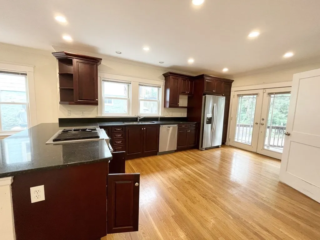5 bed, 2 bath apartment for rent at 15 Sunset St Unit 1, Mission Hill — photo 1 of 14
